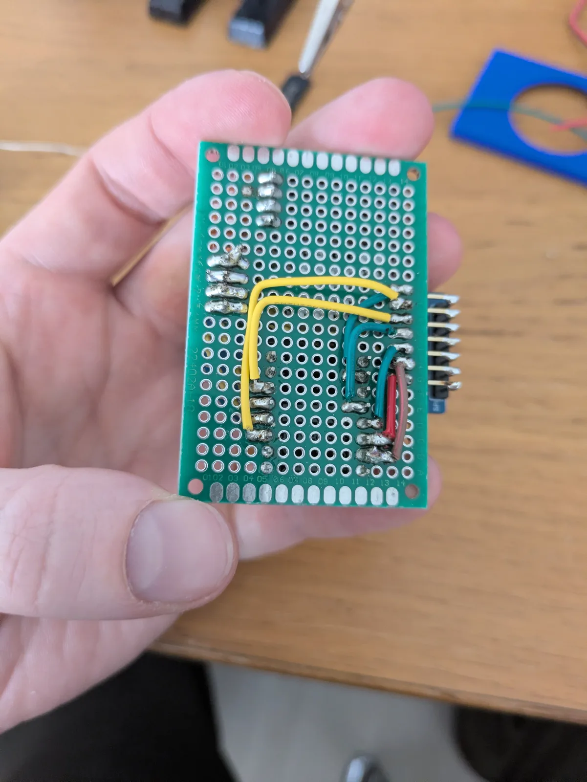 The soldered wiring underneath the perfboard.