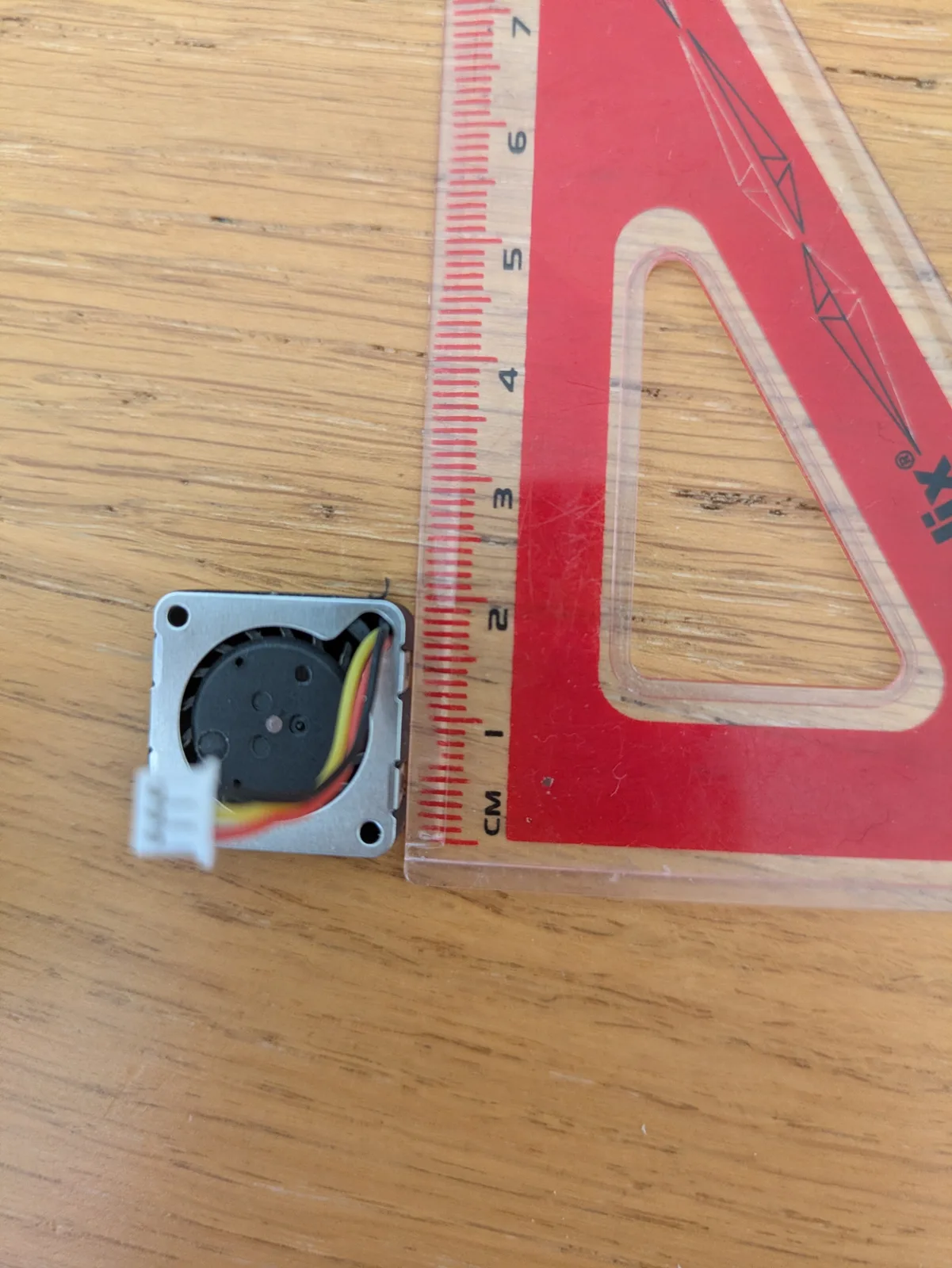 Blower footprint beside a ruler.