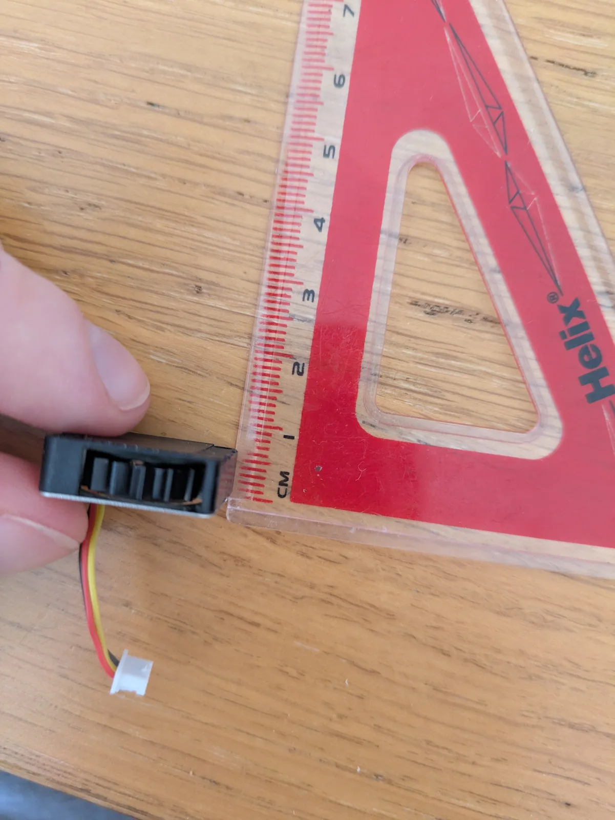 Blower depth beside a ruler.