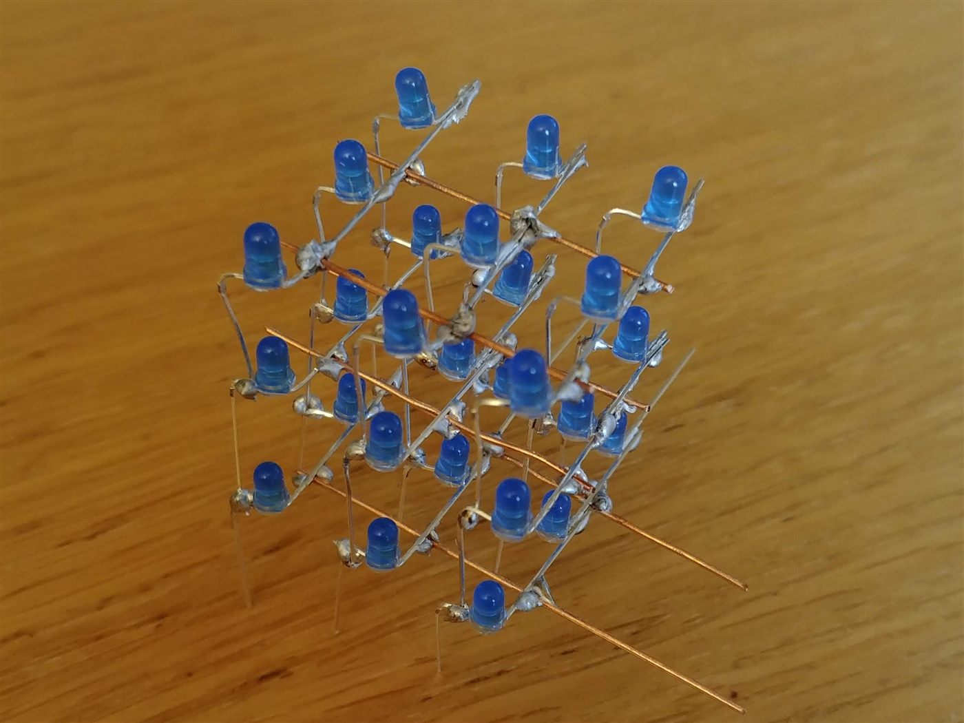 Hand-soldered cube of blue LEDs